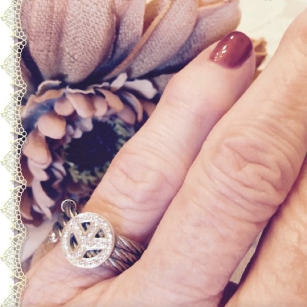 Peace-925 Sterling and Stainless Coil Ring.